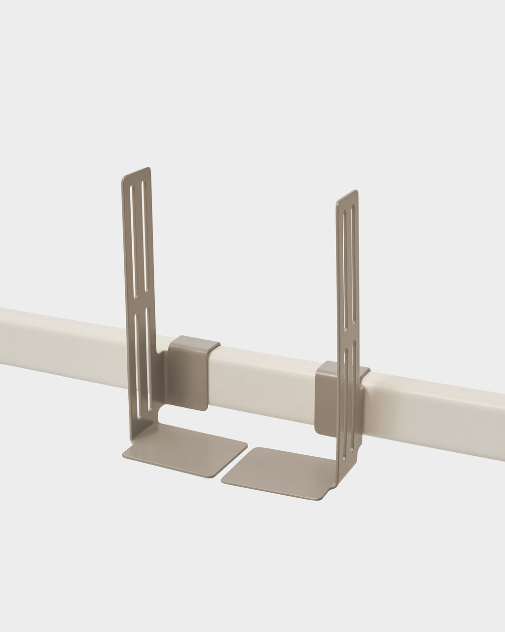 Oat Box Mount studio packshot, two slotted metal brackets clamped onto a white rail with L-shaped shelf feet