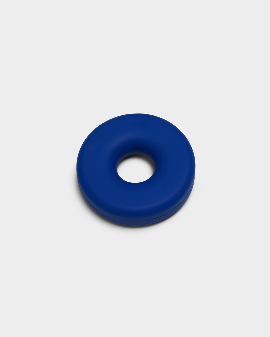 Ultra Marine Cable Bagel cable manager, donut-shaped silicone ring shown at a three-quarter angle in a studio packshot