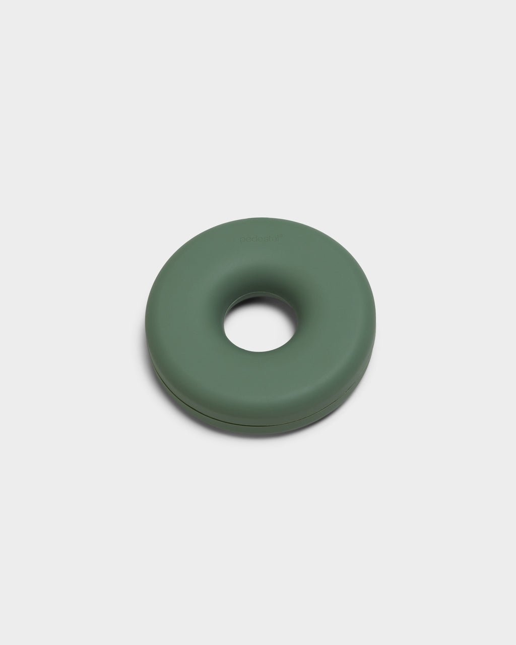 Mossy Green Cable Bagel cable manager, donut-shaped silicone case shown at an angle in a studio packshot