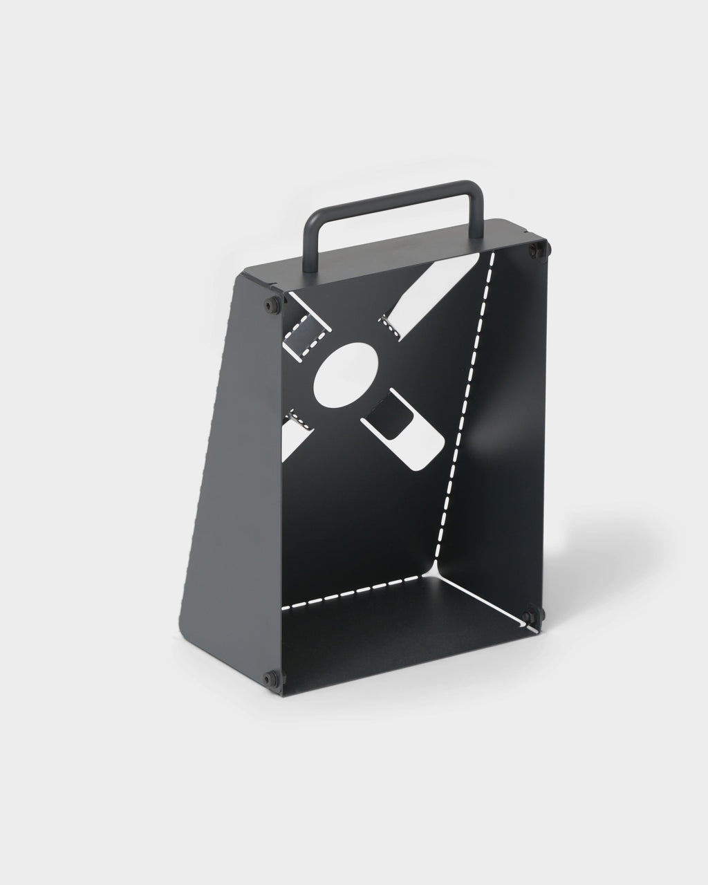 Angled studio view of the charcoal Cable Stand, showing carry handle, cut-out cable ports and bolted side panels