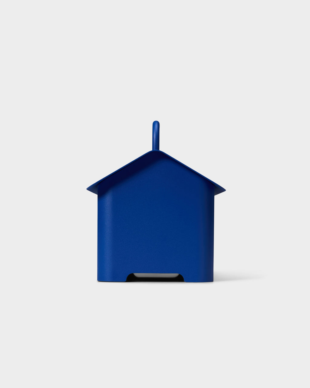 Cable Villa in Ultra Marine shown front-on as a house-shaped cable box with chimney, studio packshot on white