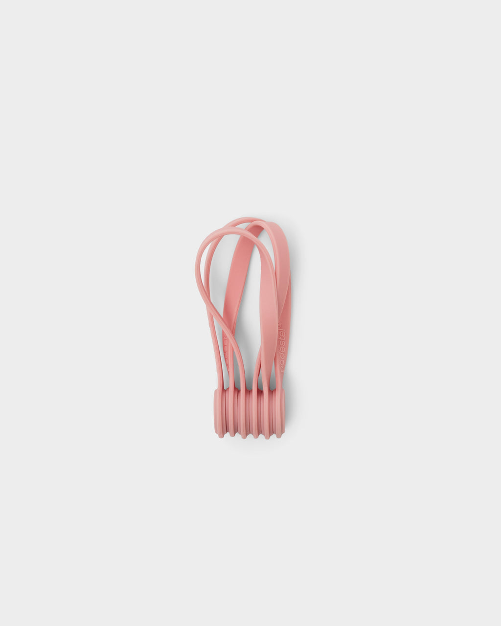 Bubble Gum pink Magnetic Cable Ties bundled together upright, studio packshot on light grey with embossed logo visible