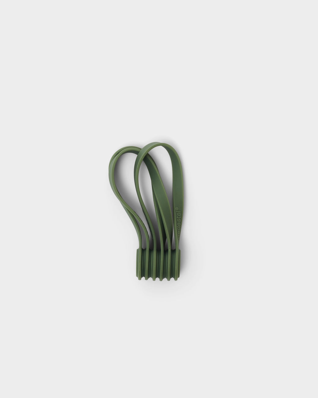 Set of mossy green Magnetic Cable Ties bundled upright in a studio packshot, looped straps with debossed logo