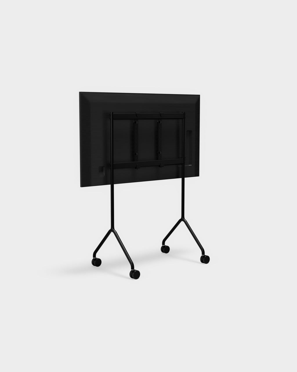 Rear three-quarter view of the Moon Light TV stand in Charcoal on a studio backdrop, showing mount bracket and casters