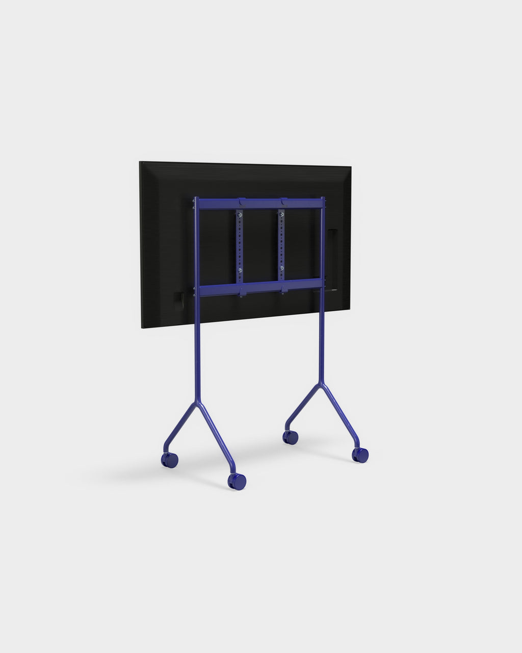 Rear three-quarter view of the Moon Light TV stand in Ultra Marine with mounted flat screen and castor wheels, studio backdrop