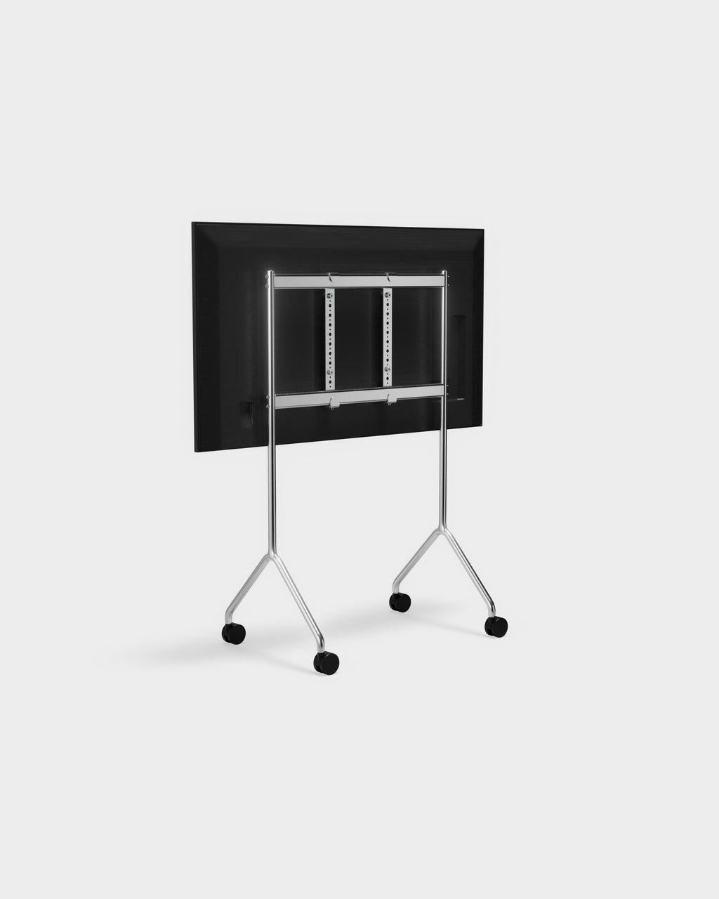 Rear angled view of Moon Light TV stand in chrome with mounted display, VESA bracket and casters, studio packshot