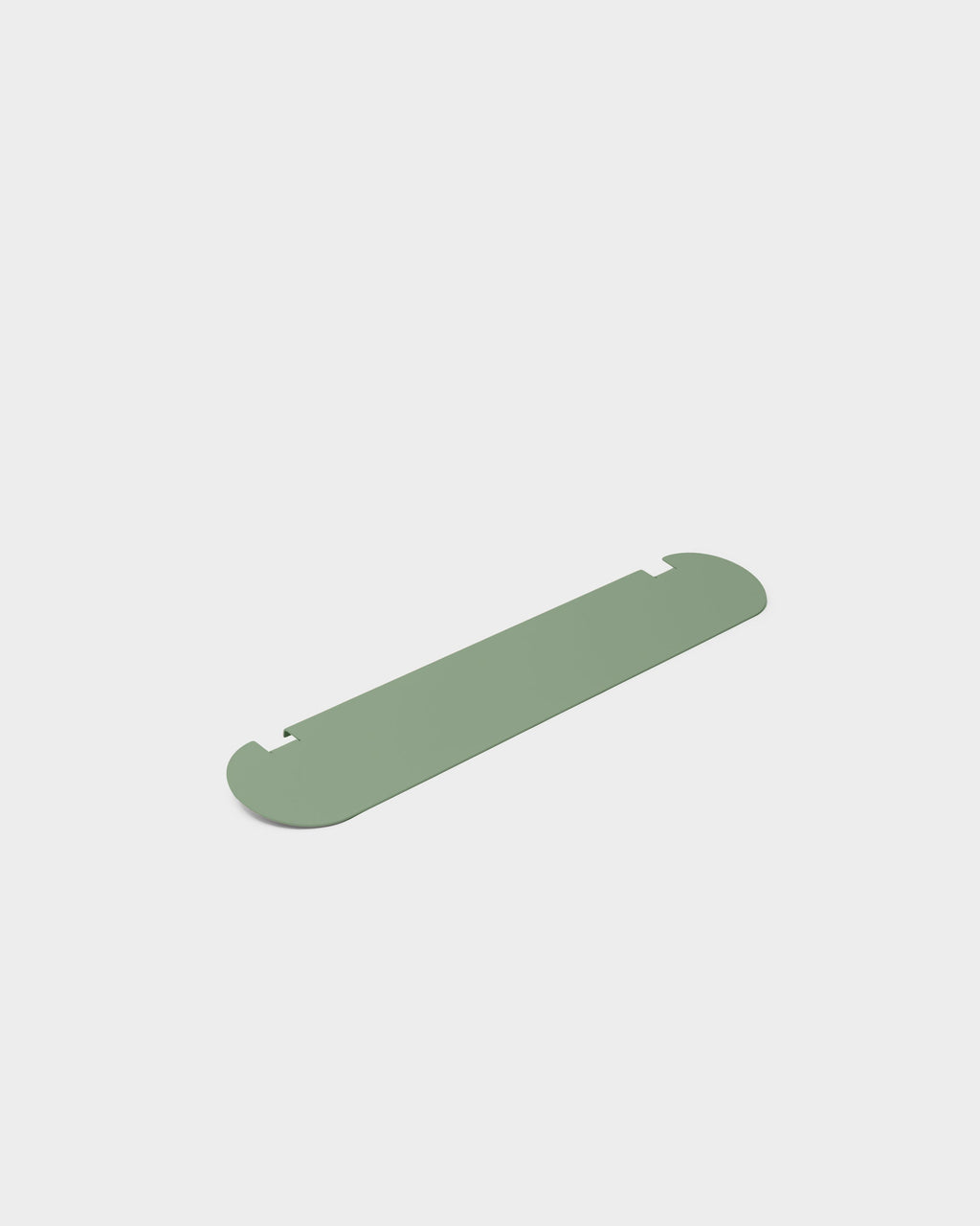 Moon Light Shelf in Mossy Green shown at an angle in a studio packshot, rounded metal shelf with notched back edge