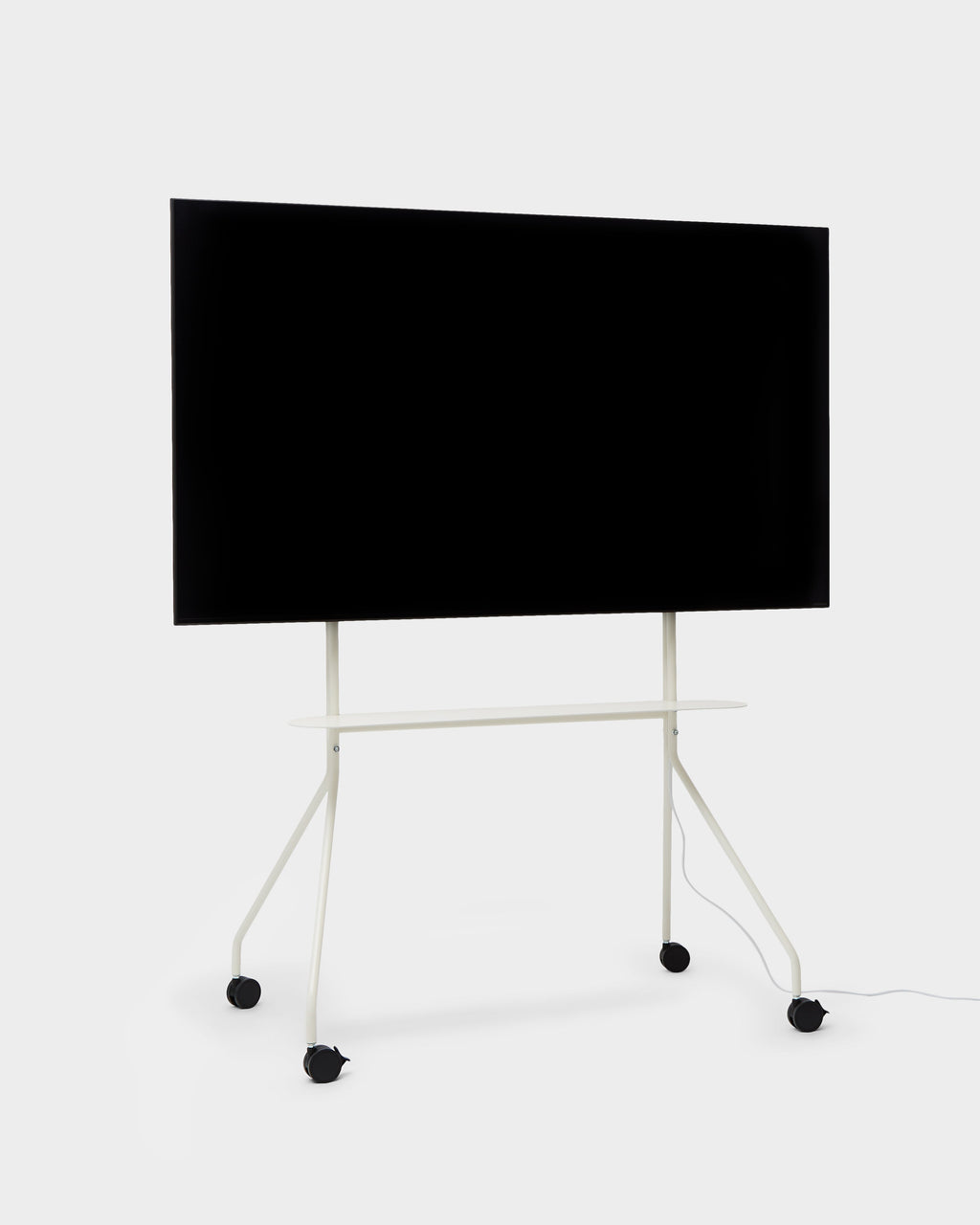 Moon PRO TV stand in Pearl holding a large flat-screen TV, angled studio packshot showing shelf and locking casters