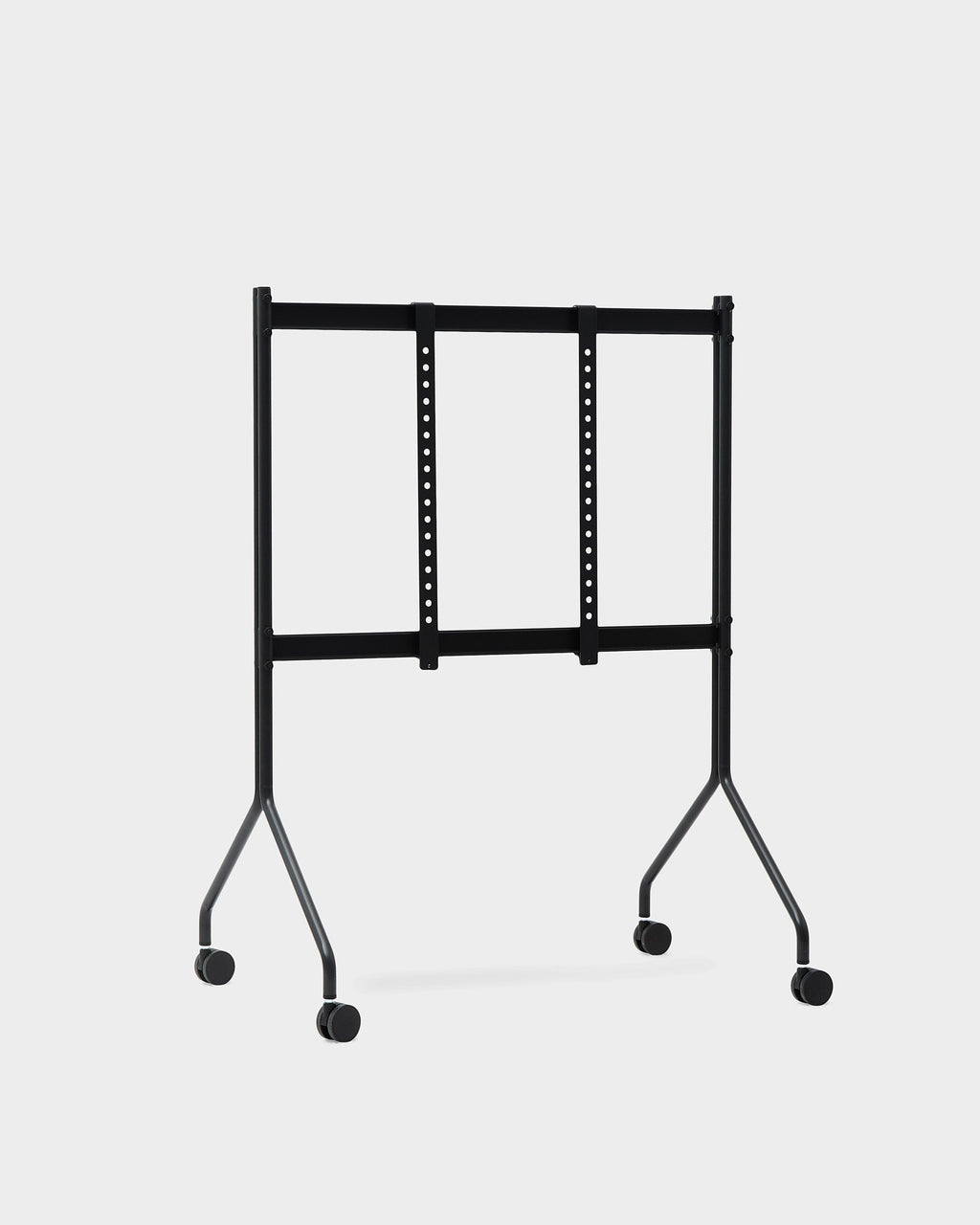 Moon TV stand in Charcoal shown from the front on a studio backdrop, empty VESA mount bars and four caster wheels