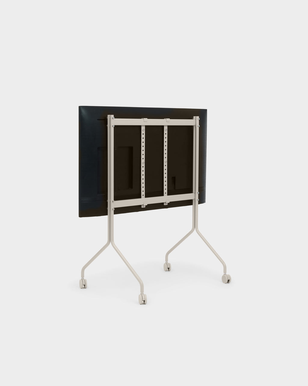 Rear angled view of the Moon stand in Oat on wheels, showing its adjustable VESA mount bracket holding a black TV