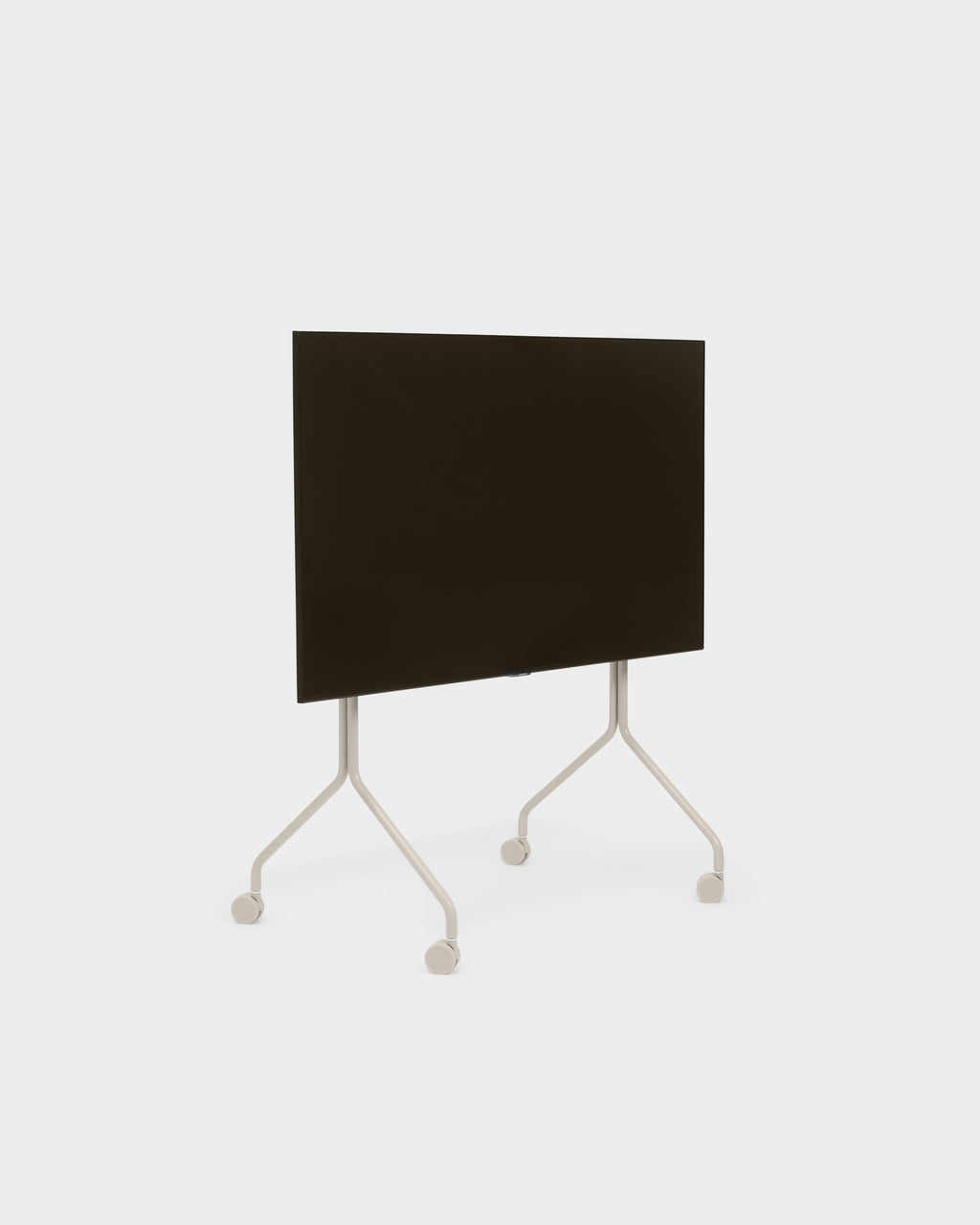 Moon in Oat rolling stand with folded-flat dark tabletop tilted upright, studio packshot angled view showing four casters