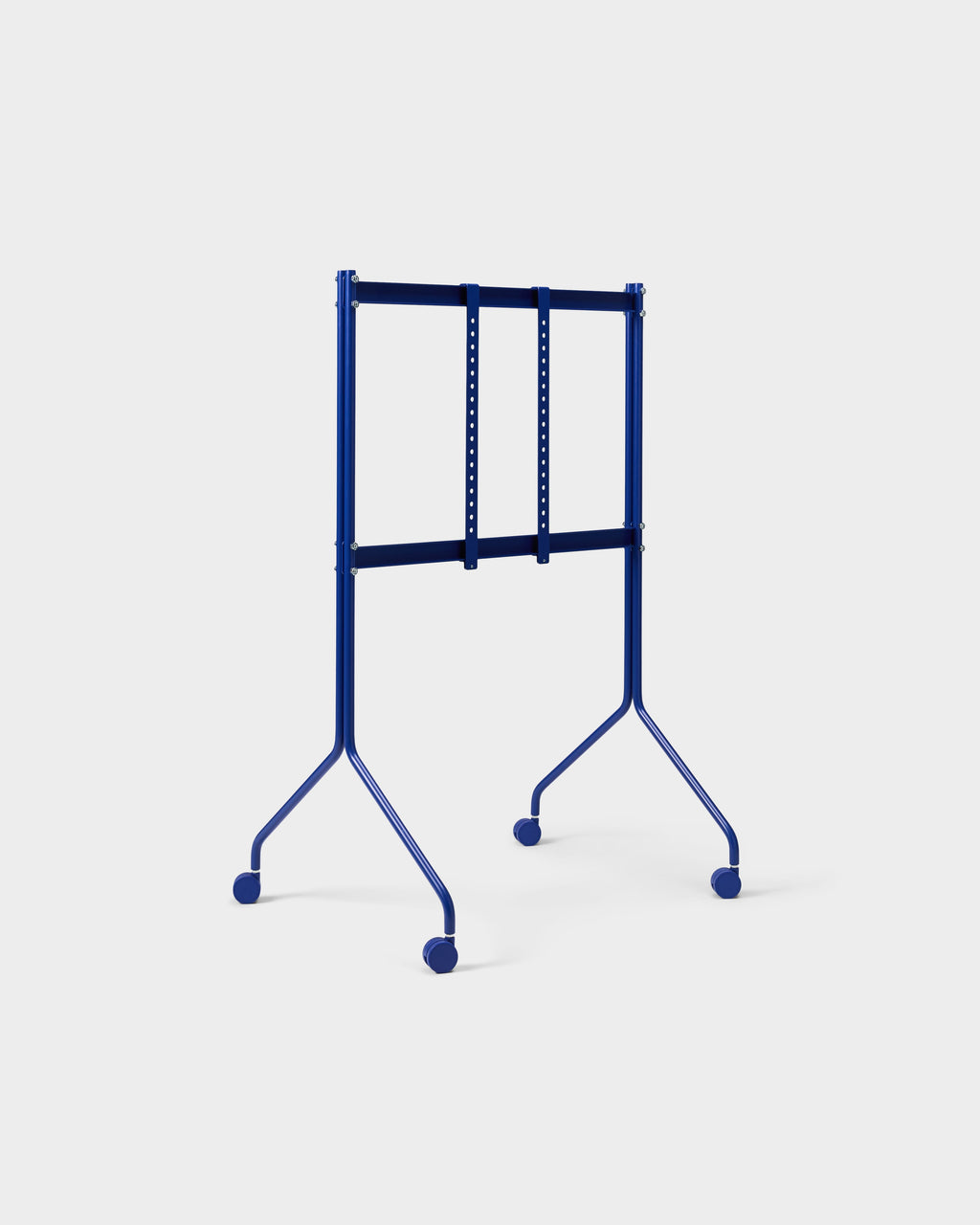 Moon Tall stand in Ultra Marine at a three-quarter studio angle, showing VESA mount bars and blue caster wheels
