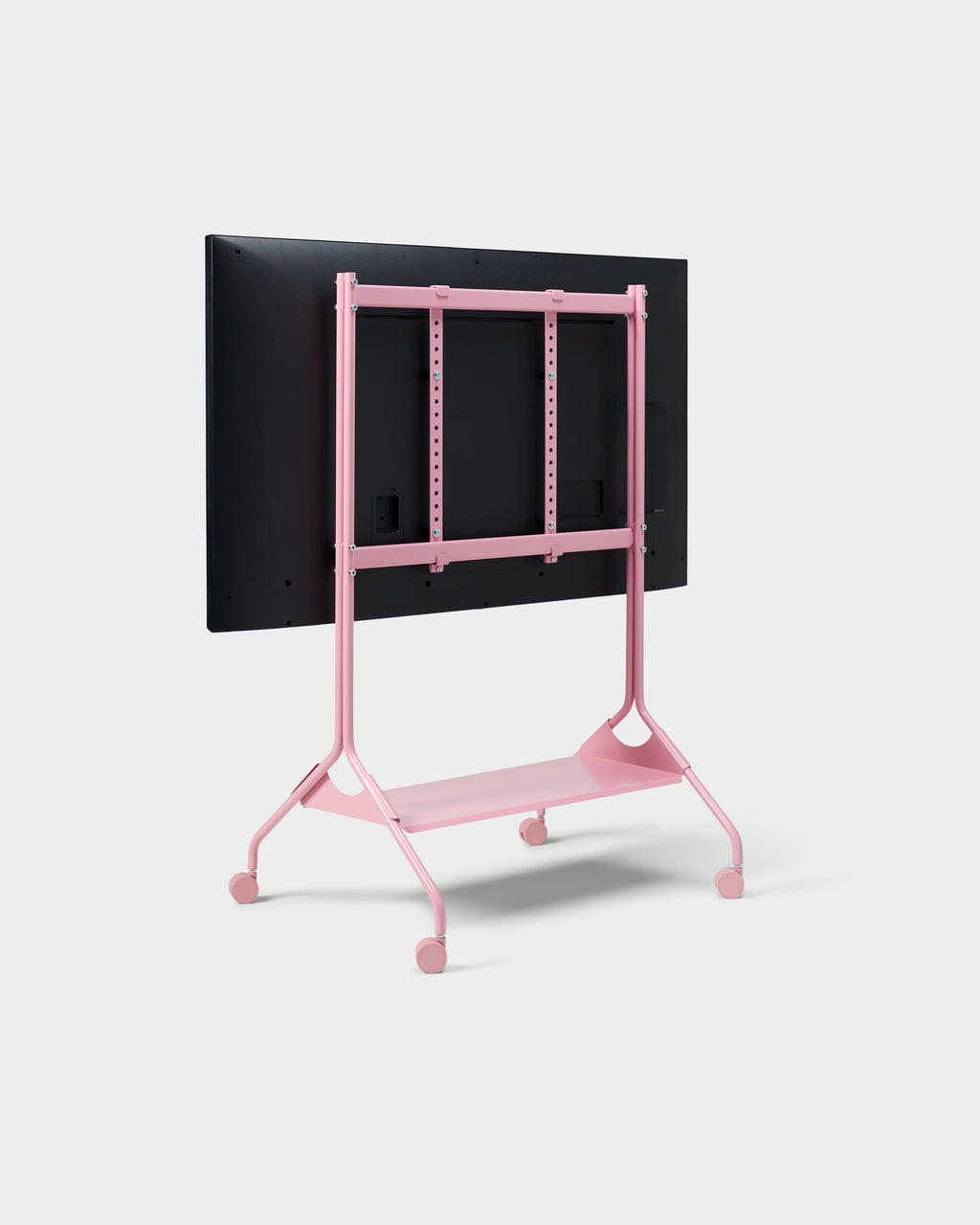 Rear three-quarter view of the Moon Tall stand in Bubble Gum pink with mounted display, shelf and casters on white