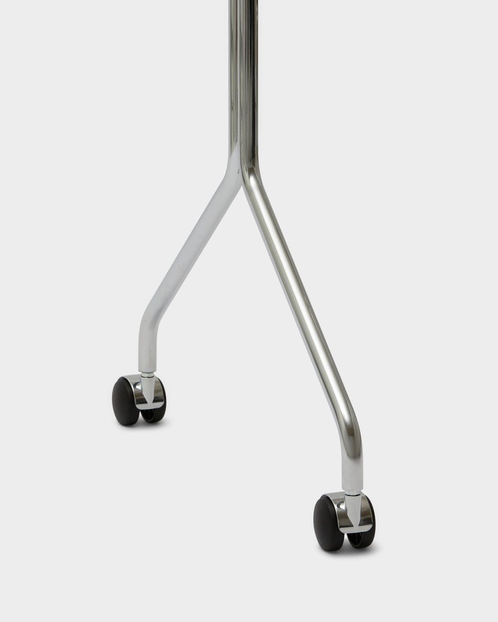 Close-up studio packshot of Wheels in Chrome, showing the polished forked base legs and black swivel castors