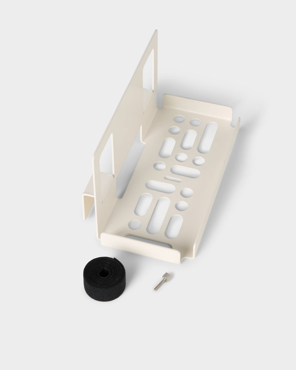 Pearl PS5 Slim Mount studio packshot with perforated tray, included thumbscrew and black hook-and-loop cable strap