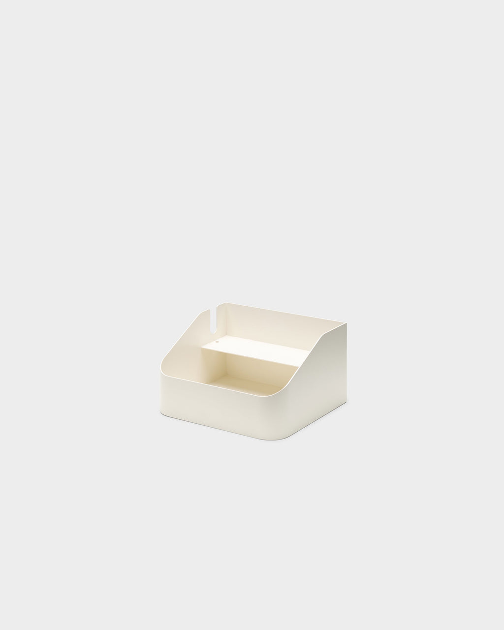 Pearl Power Bar Tray shown at an angle on a light studio background, revealing its inner shelf and cable cutout