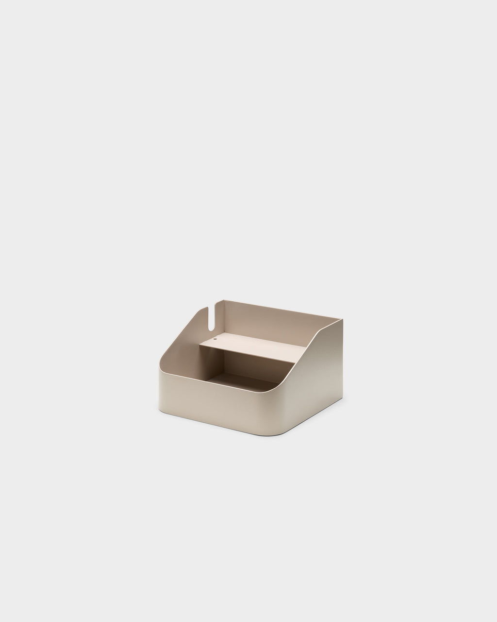 Oat Power Bar Tray shown at an angle in a studio packshot, revealing its open interior shelf and cable cutout