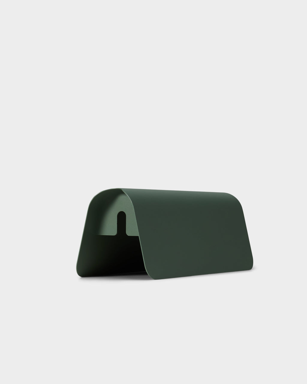 Power Shell in Mossy Green shown at an angle in a studio packshot, curved steel cover with keyhole cable cutout