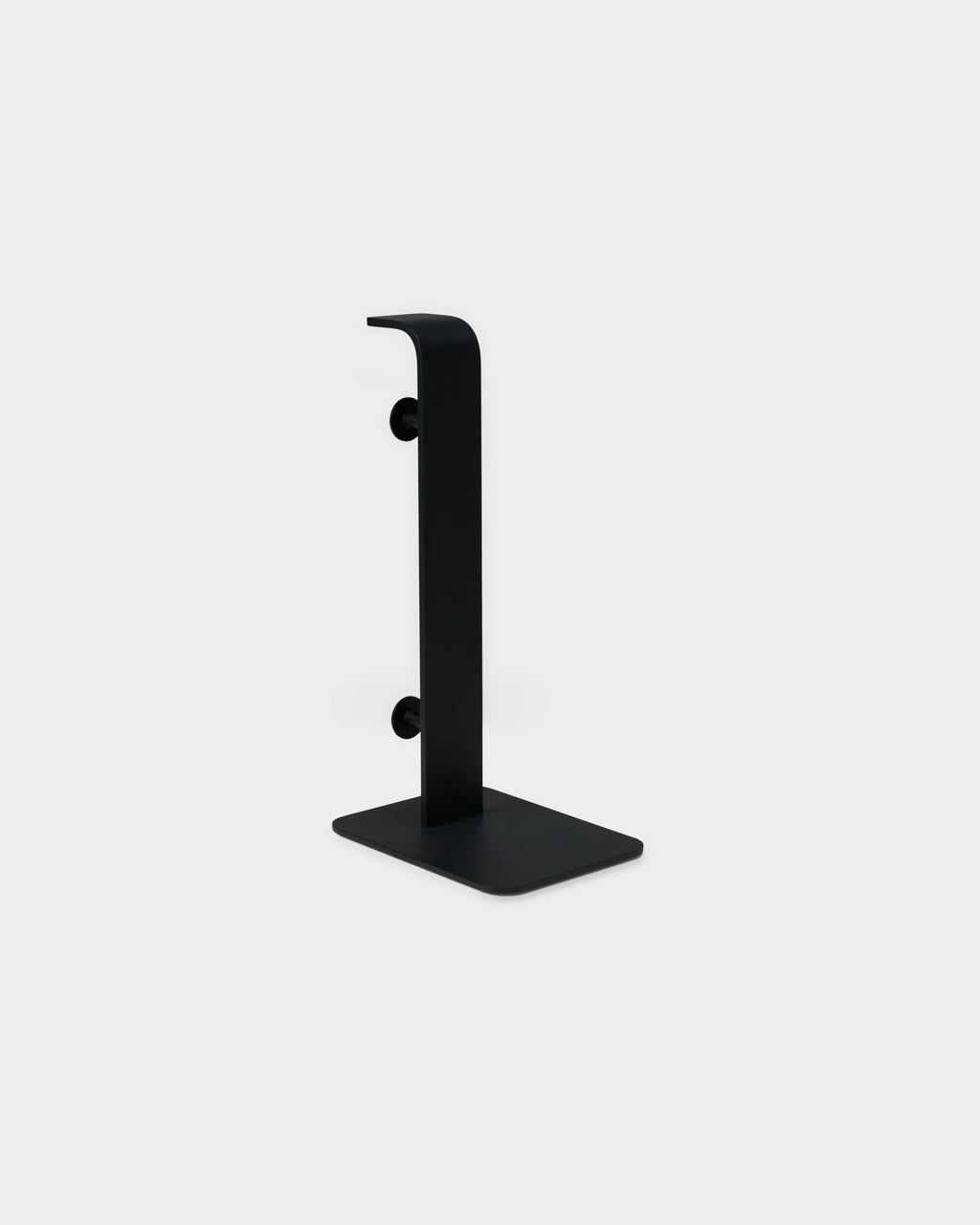 Charcoal Power Tower studio packshot, side angle showing curved upright, two mounting posts and flat rectangular base