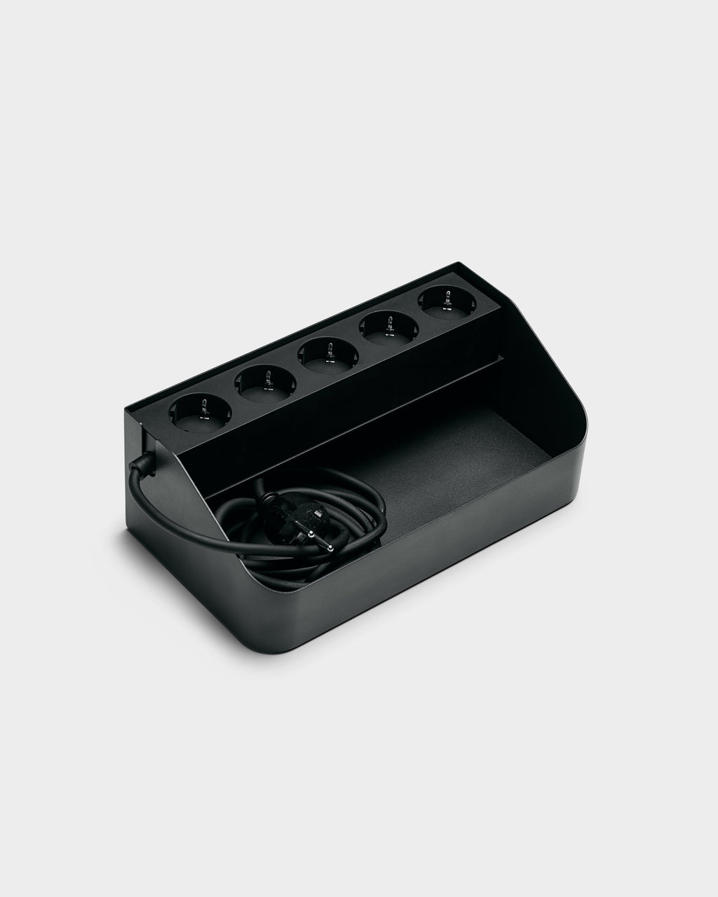 Charcoal Power Beam Tray angled studio view showing five recessed sockets and coiled cord stored in the open bin