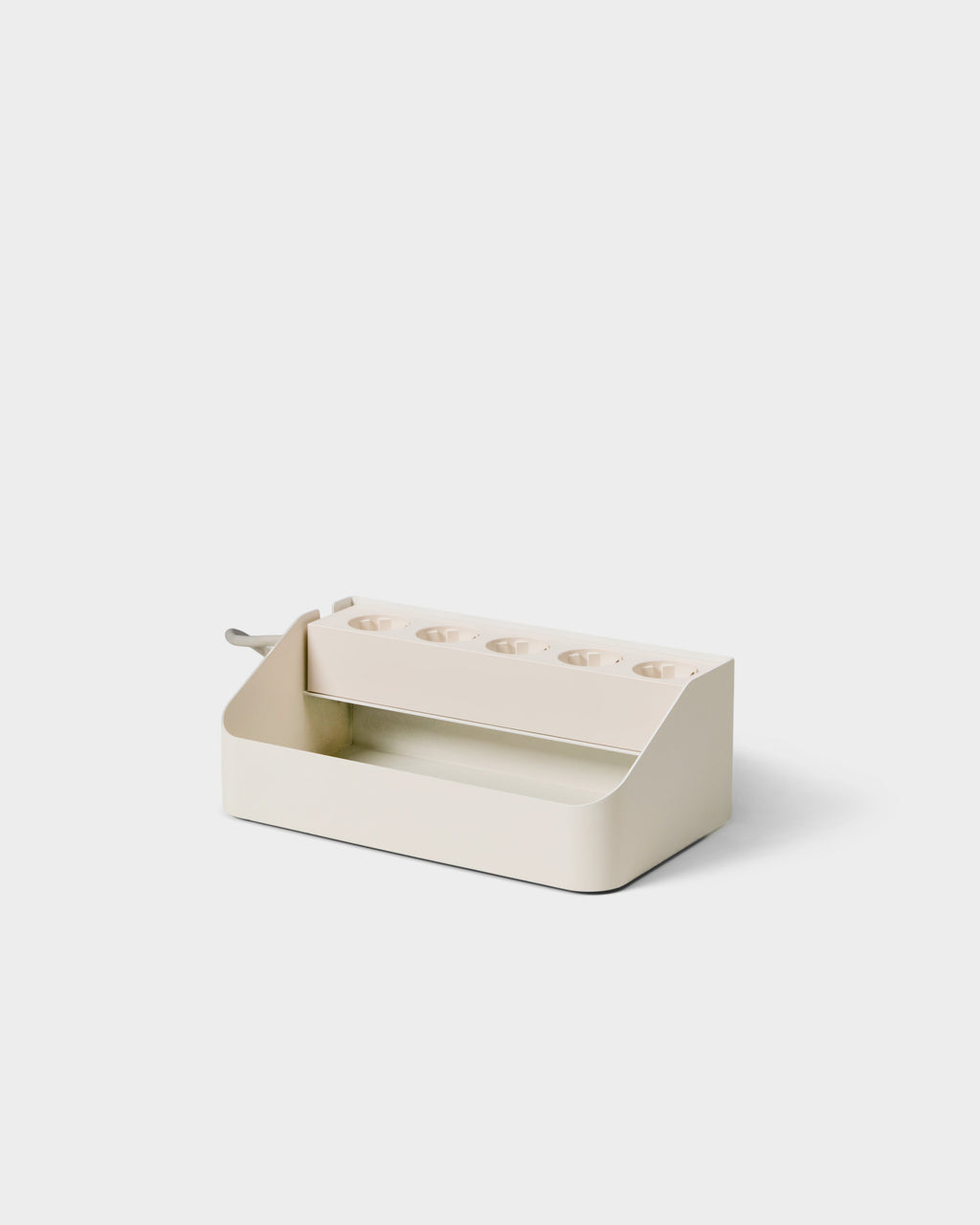 Pearl Power Beam Tray at an angle in a studio packshot, five-socket power strip nested in the open cable tray