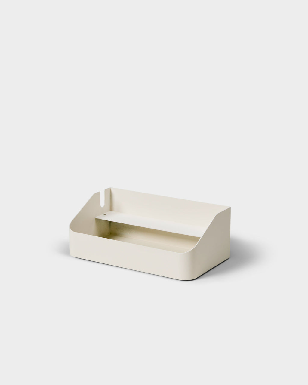 Power Beam Tray in Pearl shown at a three-quarter angle in a studio packshot, cable notch and inner shelf visible