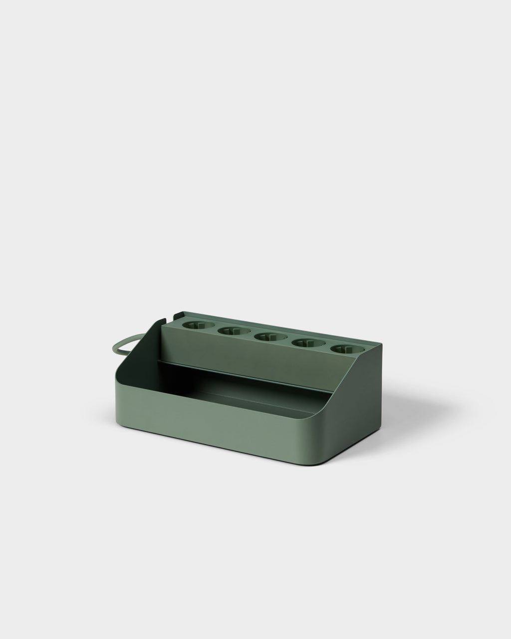 Angled studio view of the Power Beam Tray in Mossy Green, showing five outlet sockets, open storage bin and side handle