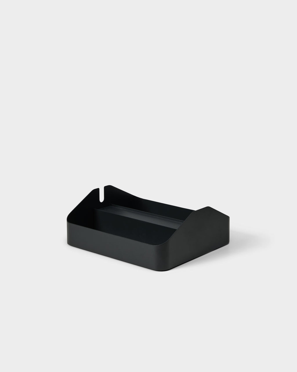 Charcoal Power Beam Tray Double shown at an angle in a studio packshot, revealing the divided interior and cable notch