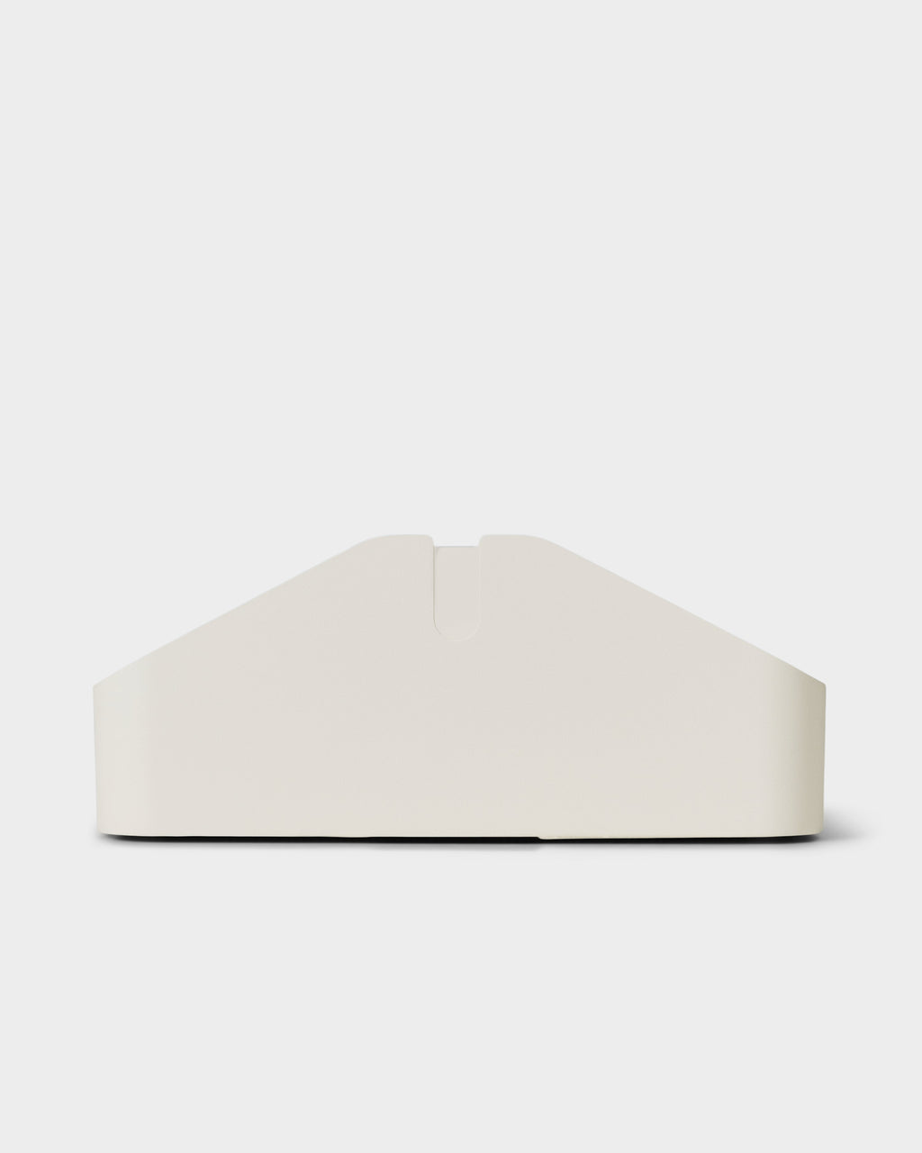 Front-on studio packshot of the Power Beam Tray Double in Pearl, showing its angled walls and central cable notch