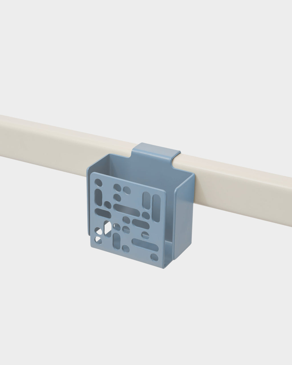 Powder Blue Remote Box Mount hooked over a cream rail, angled studio view showing perforated front panel