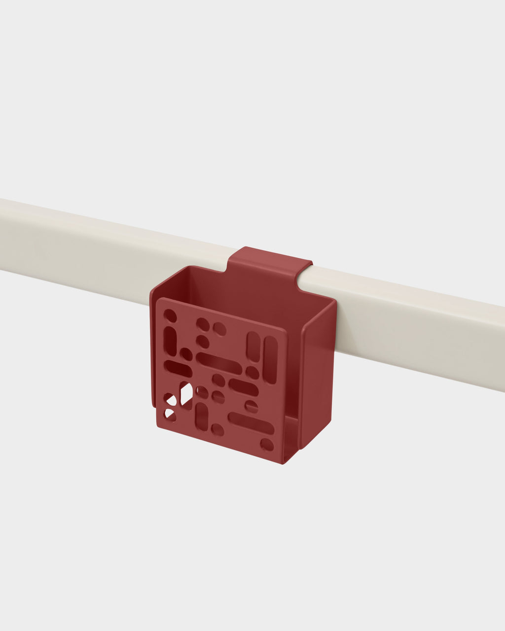 Burnin' Red Remote Box Mount clipped onto a cream rail in a studio packshot, angled to show perforated front panel