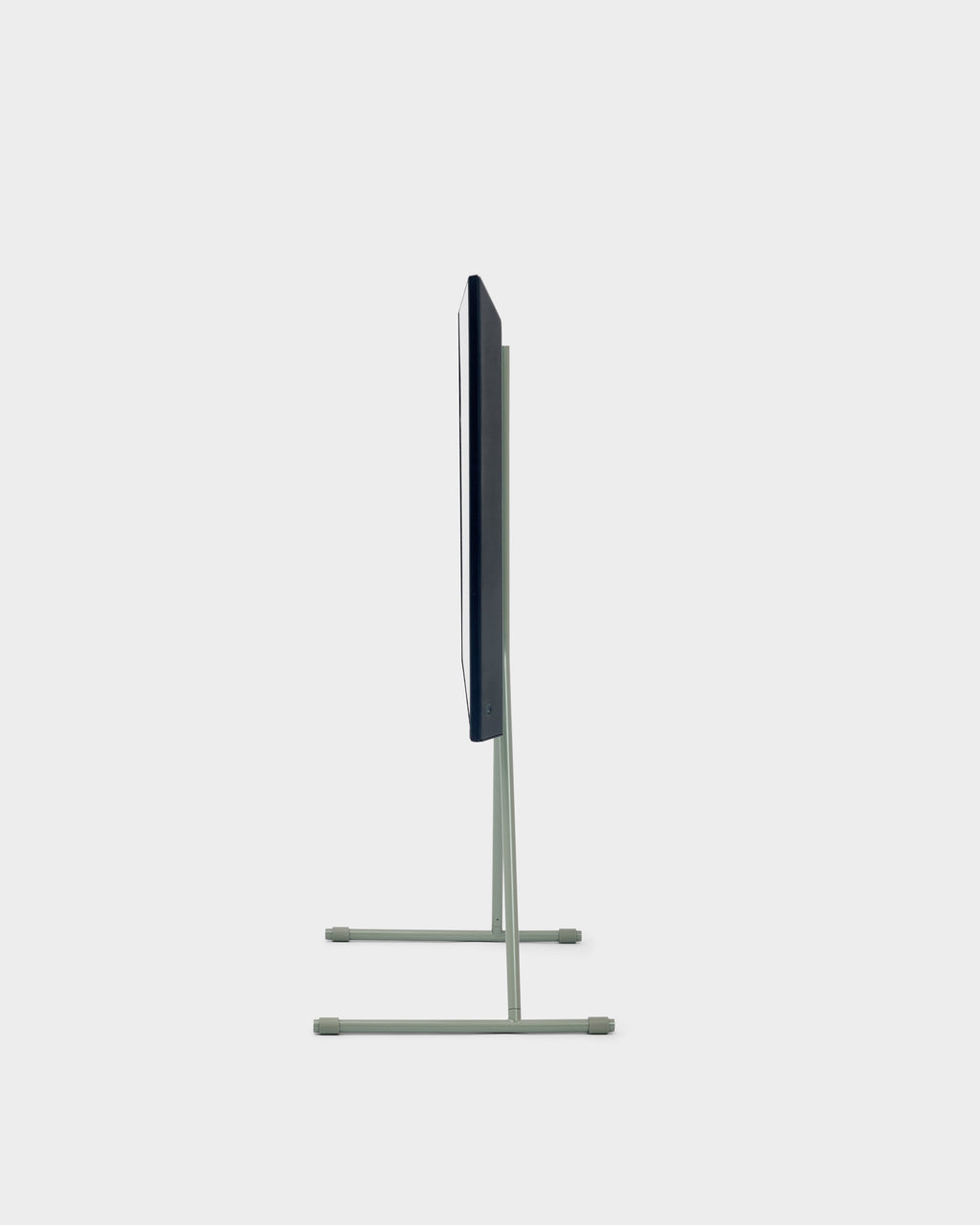 Side profile studio view of the Viva TV stand in Mossy Green holding a slim flat-screen TV on twin tube legs