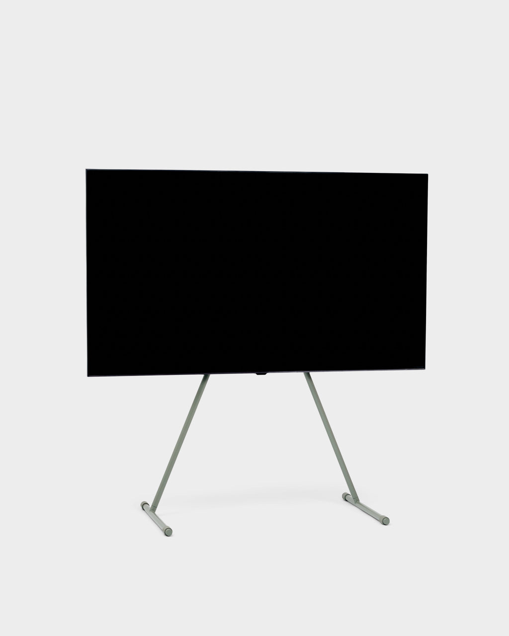 Viva TV stand in Mossy Green holding a large flat-screen TV, angled studio packshot on a light grey background