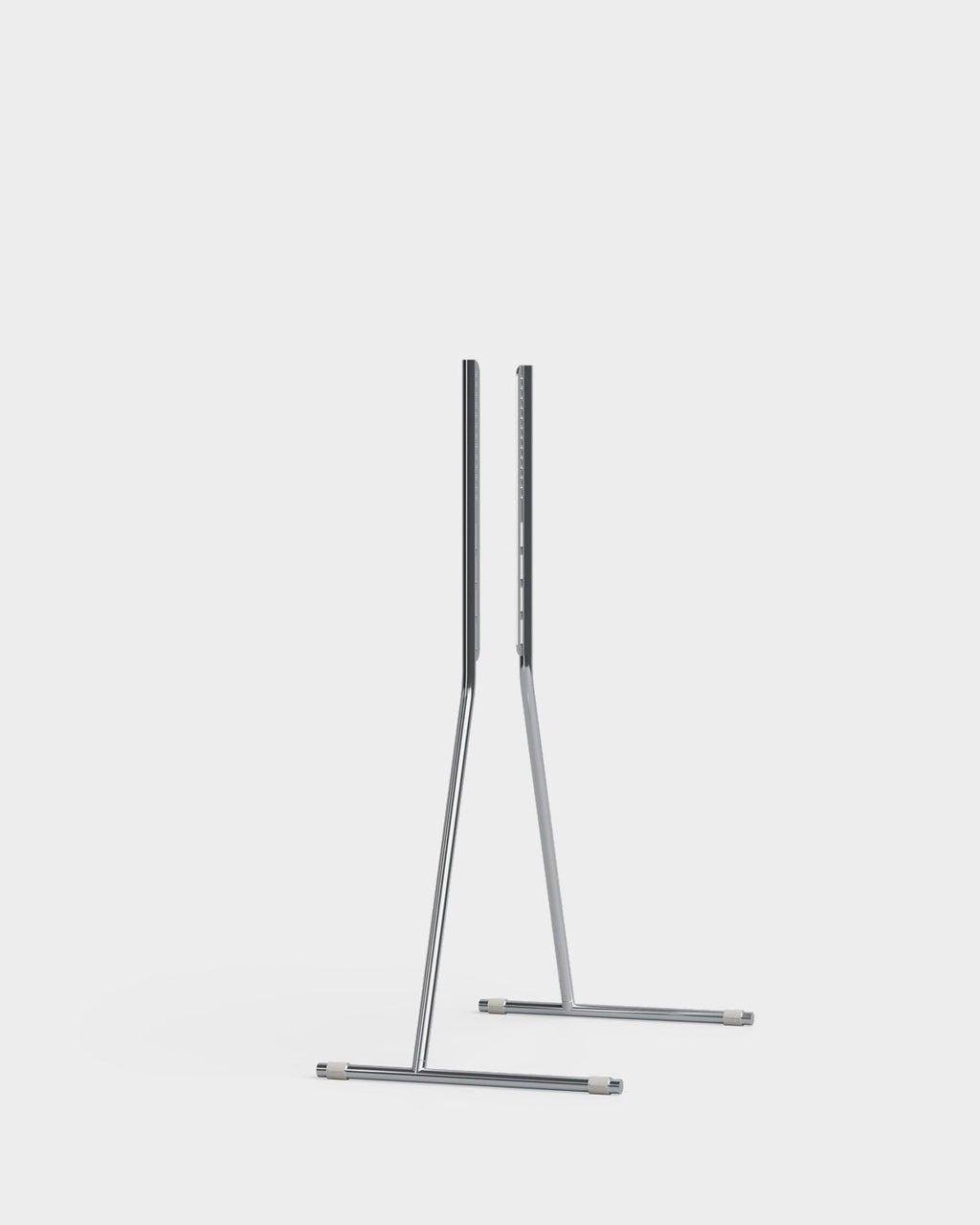 Viva TV stand in Chrome holding a large flat-screen TV, angled studio packshot on a light grey background