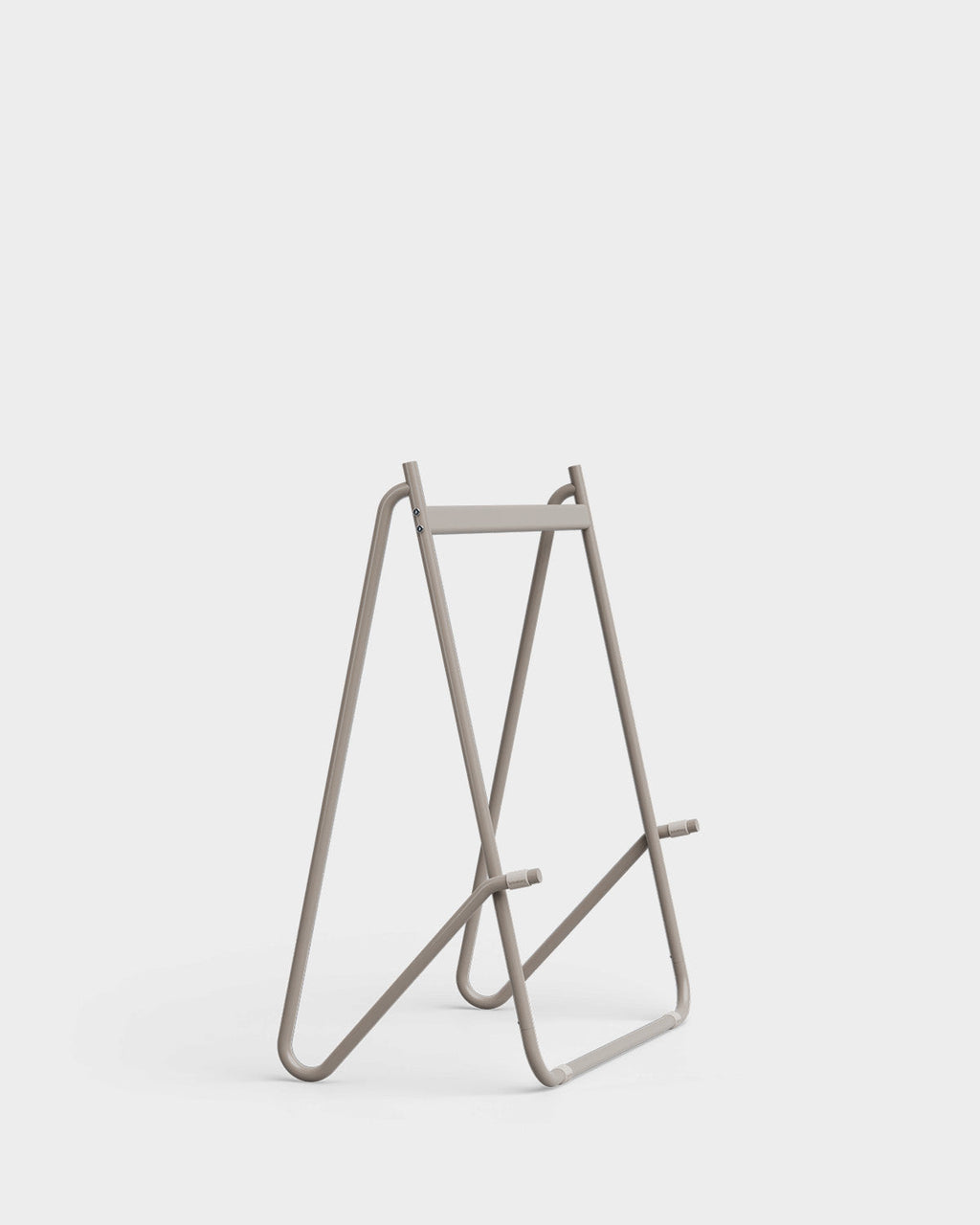 Bloom stand in Oat holding a black flat-screen TV, angled studio packshot on light grey with low tubular legs